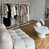 Free standing display racks for clothing store modern design painted white for minimalistic look